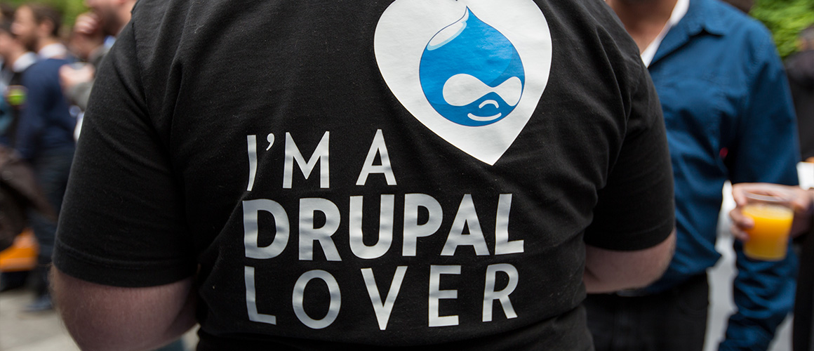 A guy wearing t-shirt with I'm Drupal Lover